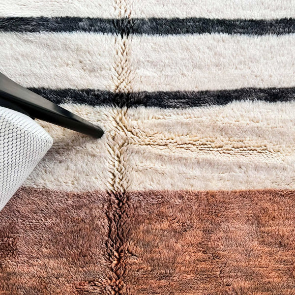 The potential health benefits of using natural fiber rugs like Beni Ourain, including improved air quality and reduced allergens. - azilal rug