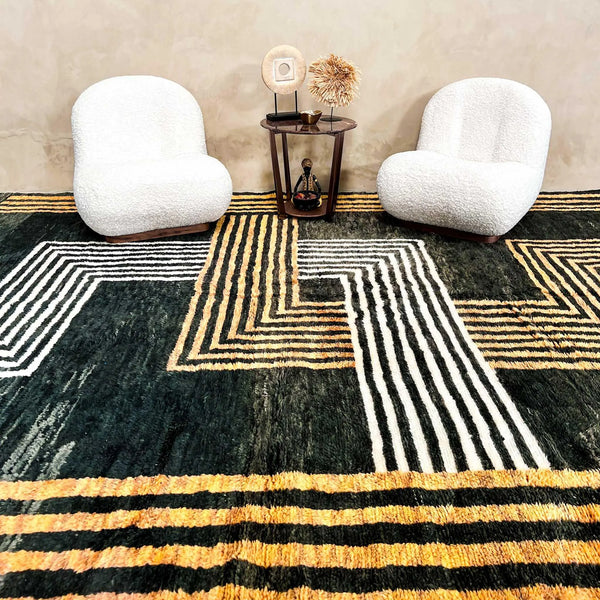 The use of Beni Ourain rugs in non-traditional spaces, such as offices, hotels, and commercial interiors, and how they contribute to the overall design scheme. - azilal rug